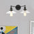 2 Light Living Room Wall Lighting Vintage Black/Brass/Bronze Sconce Light with Saucer Clear Glass Shade Black Clearhalo 'Art deco wall lights' 'Cast Iron' 'Glass' 'Industrial wall lights' 'Industrial' 'Middle century wall lights' 'Modern' 'Rustic wall lights' 'Tiffany' 'Traditional wall lights' 'Wall Lamps & Sconces' 'Wall Lights' Lighting' 520181