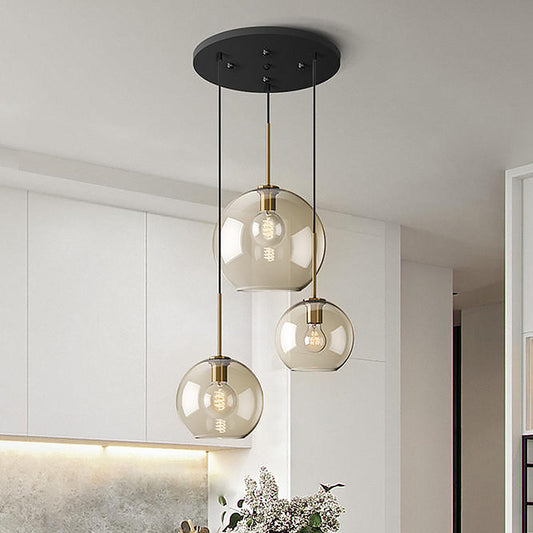 Simple 3 Lights Suspension Lighting with Amber Glass Shade Black Round Multi Lamp Pendant Clearhalo 'Ceiling Lights' 'Chandeliers' 'Glass shade' 'Glass' 'Modern Pendants' 'Modern' 'Pendant Lights' 'Pendants' Lighting' 520193