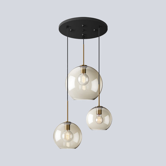 Simple 3 Lights Suspension Lighting with Amber Glass Shade Black Round Multi Lamp Pendant Clearhalo 'Ceiling Lights' 'Chandeliers' 'Glass shade' 'Glass' 'Modern Pendants' 'Modern' 'Pendant Lights' 'Pendants' Lighting' 520195