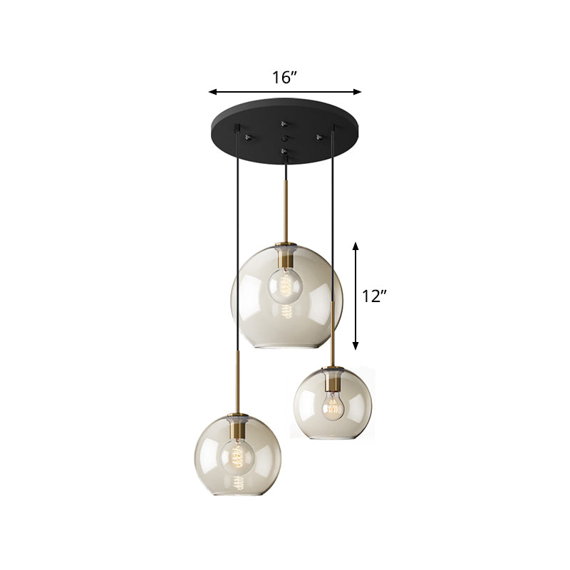 Simple 3 Lights Suspension Lighting with Amber Glass Shade Black Round Multi Lamp Pendant Clearhalo 'Ceiling Lights' 'Chandeliers' 'Glass shade' 'Glass' 'Modern Pendants' 'Modern' 'Pendant Lights' 'Pendants' Lighting' 520196