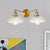 Domed Living Room Wall Light Industrial Clear Ribbed Glass 2 Lights Bronze/Brass/Copper Sconce Lamp Brass Clearhalo 'Art deco wall lights' 'Cast Iron' 'Glass' 'Industrial wall lights' 'Industrial' 'Middle century wall lights' 'Modern' 'Rustic wall lights' 'Tiffany' 'Traditional wall lights' 'Wall Lamps & Sconces' 'Wall Lights' Lighting' 520209