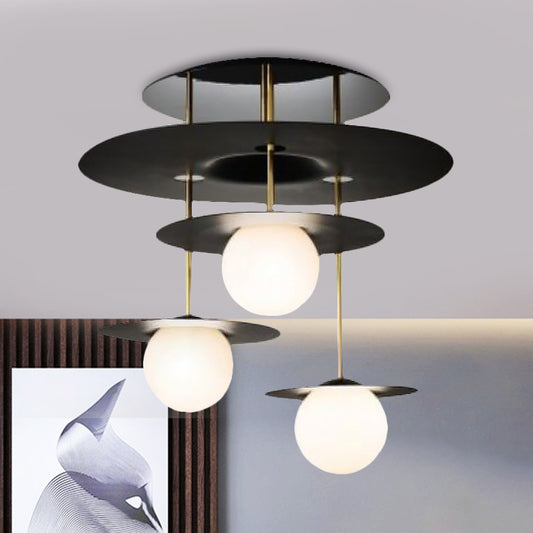 Metal Disk Flush Light Fixture Modernist 3 Bulbs Black Semi Flush Mount Ceiling Lamp with Ball White Glass Shade Clearhalo 'Ceiling Lights' 'Close To Ceiling Lights' 'Close to ceiling' 'Glass shade' 'Glass' 'Semi-flushmount' Lighting' 520596