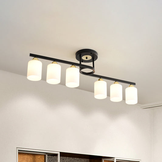6-Light Living Room Semi Flushmount Modernism Black Ceiling Flush Mount with Cylinder Cream Glass Shade Black Clearhalo 'Ceiling Lights' 'Close To Ceiling Lights' 'Close to ceiling' 'Glass shade' 'Glass' 'Pendant Lights' 'Semi-flushmount' Lighting' 520635