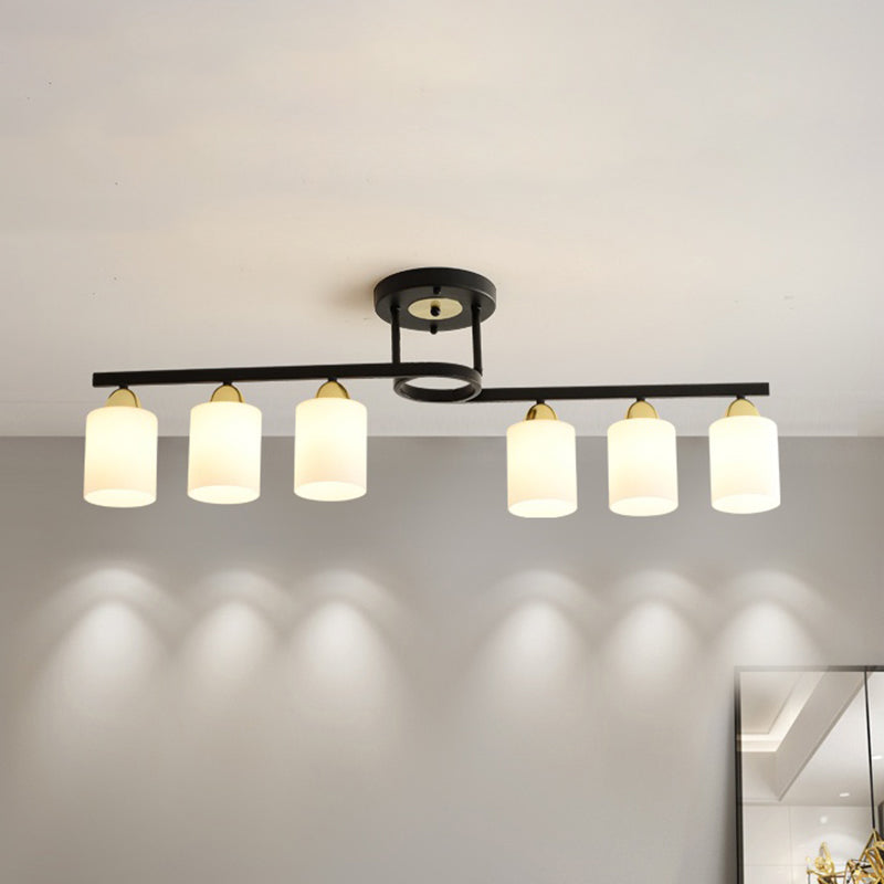 6-Light Living Room Semi Flushmount Modernism Black Ceiling Flush Mount with Cylinder Cream Glass Shade Clearhalo 'Ceiling Lights' 'Close To Ceiling Lights' 'Close to ceiling' 'Glass shade' 'Glass' 'Pendant Lights' 'Semi-flushmount' Lighting' 520636