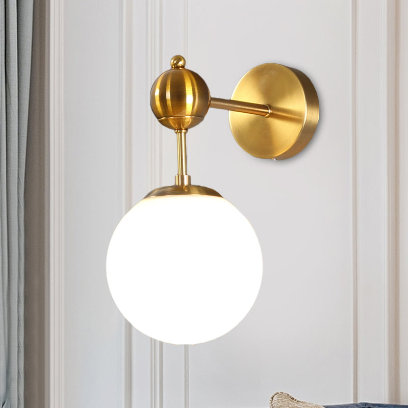 White Glass Global Wall Light Fixture Post Modern 1-Bulb Sconce Lamp in Brass with Adjustable Node Clearhalo 'Cast Iron' 'Glass' 'Industrial' 'Modern wall lights' 'Modern' 'Tiffany' 'Traditional wall lights' 'Wall Lamps & Sconces' 'Wall Lights' Lighting' 520737