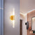 Minimalist Slim Tubular Wall Sconce White Glass LED Corner Wall Lighting Fixture in Brass - Brass - Clearhalo - 'Cast Iron' - 'Glass' - 'Industrial' - 'Modern wall lights' - 'Modern' - 'Tiffany' - 'Traditional wall lights' - 'Wall Lamps & Sconces' - 'Wall Lights' - Lighting' - 520746
