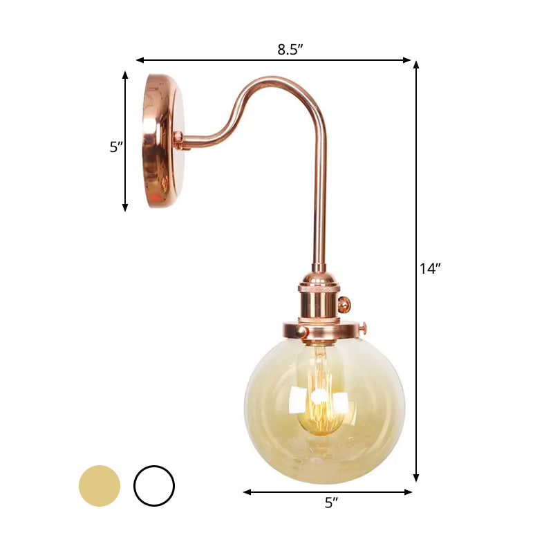 Vintage Globe Wall Lighting 1 Light Clear/Amber Glass Sconce in Copper with Curved Arm Clearhalo 'Art deco wall lights' 'Cast Iron' 'Glass' 'Industrial wall lights' 'Industrial' 'Middle century wall lights' 'Modern' 'Rustic wall lights' 'Tiffany' 'Traditional wall lights' 'Wall Lamps & Sconces' 'Wall Lights' Lighting' 521303