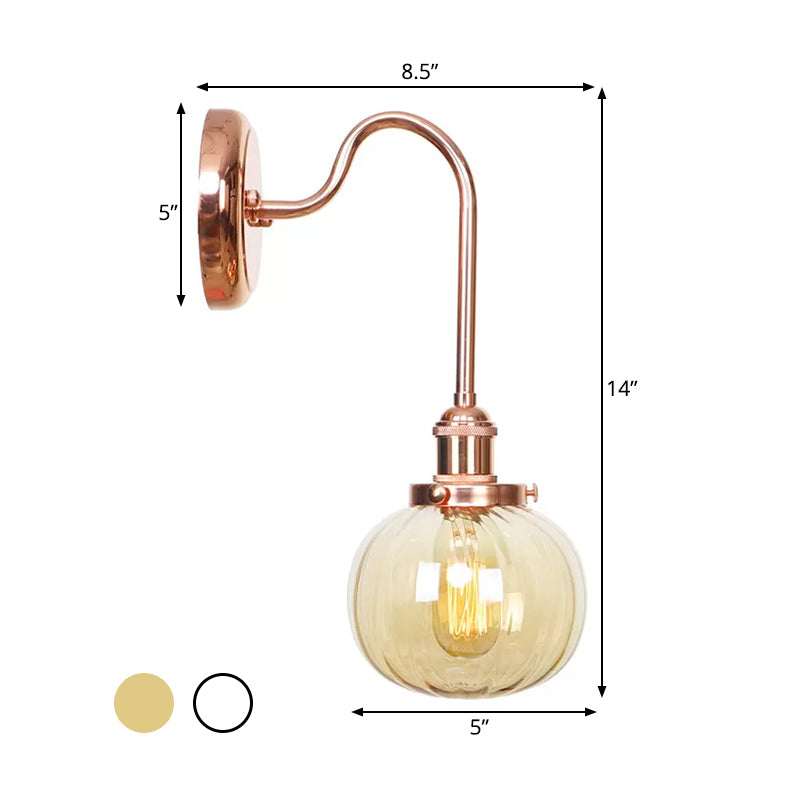 Vintage Globe Wall Lighting 1 Light Clear/Amber Glass Sconce in Copper with Curved Arm Clearhalo 'Art deco wall lights' 'Cast Iron' 'Glass' 'Industrial wall lights' 'Industrial' 'Middle century wall lights' 'Modern' 'Rustic wall lights' 'Tiffany' 'Traditional wall lights' 'Wall Lamps & Sconces' 'Wall Lights' Lighting' 521305
