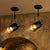 Farmhouse Cylindrical Sconce Lighting 1-Light Iron Wall Lamp Fixture in Black with Adjustable Handle Black Clearhalo 'Art deco wall lights' 'Cast Iron' 'Glass' 'Industrial wall lights' 'Industrial' 'Middle century wall lights' 'Modern' 'Rustic wall lights' 'Tiffany' 'Traditional wall lights' 'Wall Lamps & Sconces' 'Wall Lights' Lighting' 537384