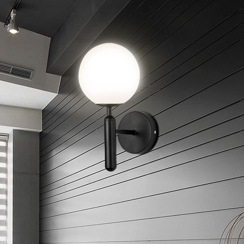 1 Light Clear Textured Glass Wall Sconce Light Modern Black Globe Bedroom Lighting Fixture Clearhalo 'Cast Iron' 'Glass' 'Industrial wall lights' 'Industrial' 'Middle century wall lights' 'Modern' 'Tiffany' 'Traditional wall lights' 'Wall Lamps & Sconces' 'Wall Lights' Lighting' 598099
