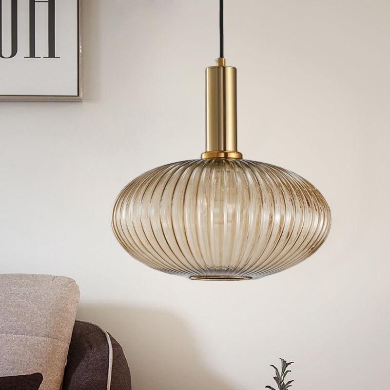 Black/Gold Cylinder/Oval/Capsule Pendant Lamp Modernist 1 Light Grey/Green/Amber Ribbed Glass Ceiling Light Fixture for Kitchen Gold Amber Oval Clearhalo 'Ceiling Lights' 'Glass shade' 'Glass' 'Modern Pendants' 'Modern' 'Pendant Lights' 'Pendants' Lighting' 598349