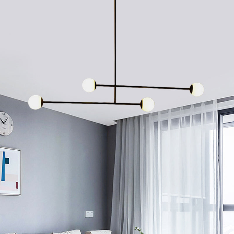 Black Linear Chandelier Light Modern Style 4 Heads Metal Pendant Lamp with Ball Glass Shade for Dining Room Clearhalo 'Ceiling Lights' 'Chandeliers' 'Modern Chandeliers' 'Modern' Lighting' 598455