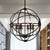 Spherical Wrought Iron Hanging Light with Wire Frame Antique Style 3/6/7 Lights Indoor Chandelier Lamp in Black/Rust 7 Black Clearhalo 'Cast Iron' 'Ceiling Lights' 'Chandeliers' 'Industrial Chandeliers' 'Industrial' 'Metal' 'Middle Century Chandeliers' 'Rustic Chandeliers' 'Tiffany' Lighting' 600512