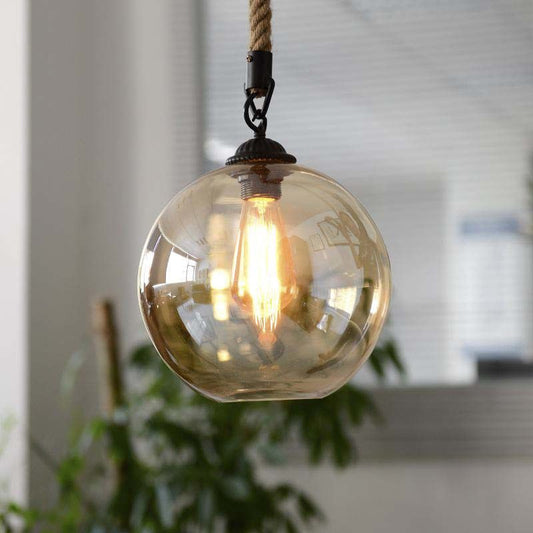 Amber Glass Ball Shade Pendant Light Fixture Vintage Style 1 Light Restaurant Hanging Lamp with Rope Amber Clearhalo 'Ceiling Lights' 'Glass shade' 'Glass' 'Industrial Pendants' 'Industrial' 'Middle Century Pendants' 'Pendant Lights' 'Pendants' 'Tiffany' Lighting' 601532
