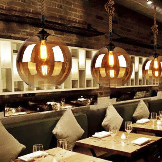 Amber Glass Ball Shade Pendant Light Fixture Vintage Style 1 Light Restaurant Hanging Lamp with Rope Clearhalo 'Ceiling Lights' 'Glass shade' 'Glass' 'Industrial Pendants' 'Industrial' 'Middle Century Pendants' 'Pendant Lights' 'Pendants' 'Tiffany' Lighting' 601534
