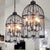 4 Heads Birdcage Chandelier Lighting Vintage Style Black/White/Rust Iron Hanging Lamp with Candle and Crystal Deco for Living Room Black Clearhalo 'Cast Iron' 'Ceiling Lights' 'Chandeliers' 'Industrial Chandeliers' 'Industrial' 'Metal' 'Middle Century Chandeliers' 'Rustic Chandeliers' 'Tiffany' Lighting' 602215