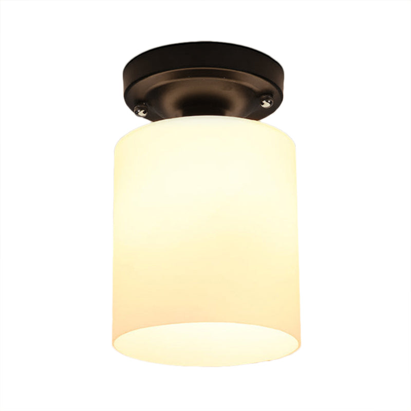 Black One Light Ceiling Mount Industrial Milky Glass Cylinder Semi Flush Light for Corridor Clearhalo 'Ceiling Lights' 'Close To Ceiling Lights' 'Close to ceiling' 'Glass shade' 'Glass' 'Island Lights' 'Semi-flushmount' Lighting' 605820