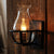 One Bulb Wall Sconce Lighting Bottle Shade Seeded Glass Industrial Living Room Light Fixture in Black Black Clearhalo 'Cast Iron' 'Glass' 'Industrial wall lights' 'Industrial' 'Middle century wall lights' 'Modern' 'Tiffany' 'Traditional wall lights' 'Wall Lamps & Sconces' 'Wall Lights' Lighting' 612664