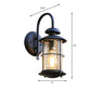 Seeded Glass Black Wall Sconce Lighting Cylinder 1-Light Traditional Light Fixture with Cage Clearhalo 'Wall Lamps & Sconces' 'Wall Lights' Lighting' 612688