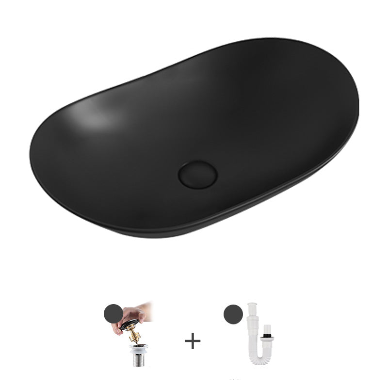 Contemporary Bathroom Sink Pop-Up Drain Porcelain Solid Color Oval-Shape Vessel Black Sink Clearhalo 'Bathroom Remodel & Bathroom Fixtures' 'Bathroom Sinks & Faucet Components' 'Bathroom Sinks' 'bathroom_sink' 'Home Improvement' 'home_improvement' 'home_improvement_bathroom_sink' 6211945