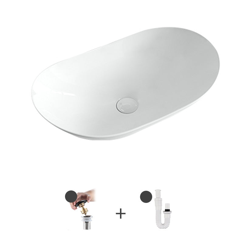 Contemporary Bathroom Sink Pop-Up Drain Porcelain Solid Color Oval-Shape Vessel White Sink Clearhalo 'Bathroom Remodel & Bathroom Fixtures' 'Bathroom Sinks & Faucet Components' 'Bathroom Sinks' 'bathroom_sink' 'Home Improvement' 'home_improvement' 'home_improvement_bathroom_sink' 6211948