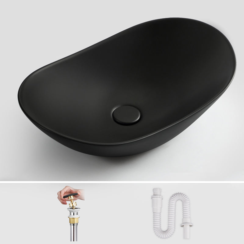 Modern Bathroom Sink Pop-Up Drain Porcelain Oval-Shape Vessel Bathroom Sink Black Sink Clearhalo 'Bathroom Remodel & Bathroom Fixtures' 'Bathroom Sinks & Faucet Components' 'Bathroom Sinks' 'bathroom_sink' 'Home Improvement' 'home_improvement' 'home_improvement_bathroom_sink' 6311850