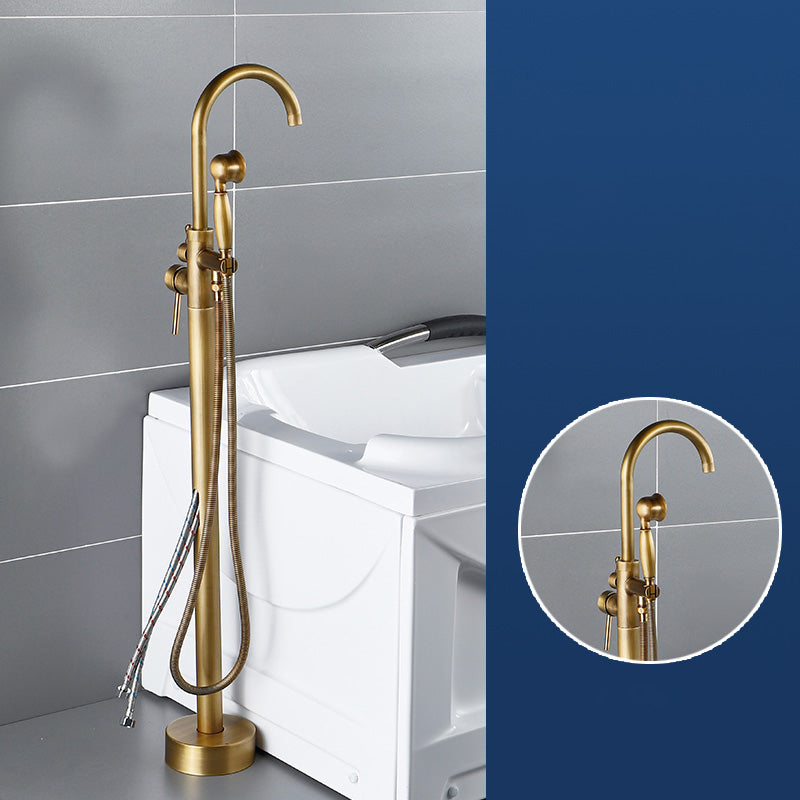 Modern Freestanding Tub Filler Trim Brass Floor Mounted Freestanding Bathtub Faucet Light Gold Hand Shower Included Wall Clearhalo 'Bathroom Remodel & Bathroom Fixtures' 'Bathtub Faucets' 'bathtub_faucets' 'Home Improvement' 'home_improvement' 'home_improvement_bathtub_faucets' 6312073