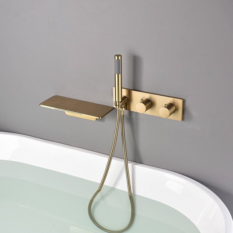 Wall Mounted Metal Tub Filler Double Handles Waterfall Tub Faucet Trim Gold Clearhalo 'Bathroom Remodel & Bathroom Fixtures' 'Bathtub Faucets' 'bathtub_faucets' 'Home Improvement' 'home_improvement' 'home_improvement_bathtub_faucets' 6400212