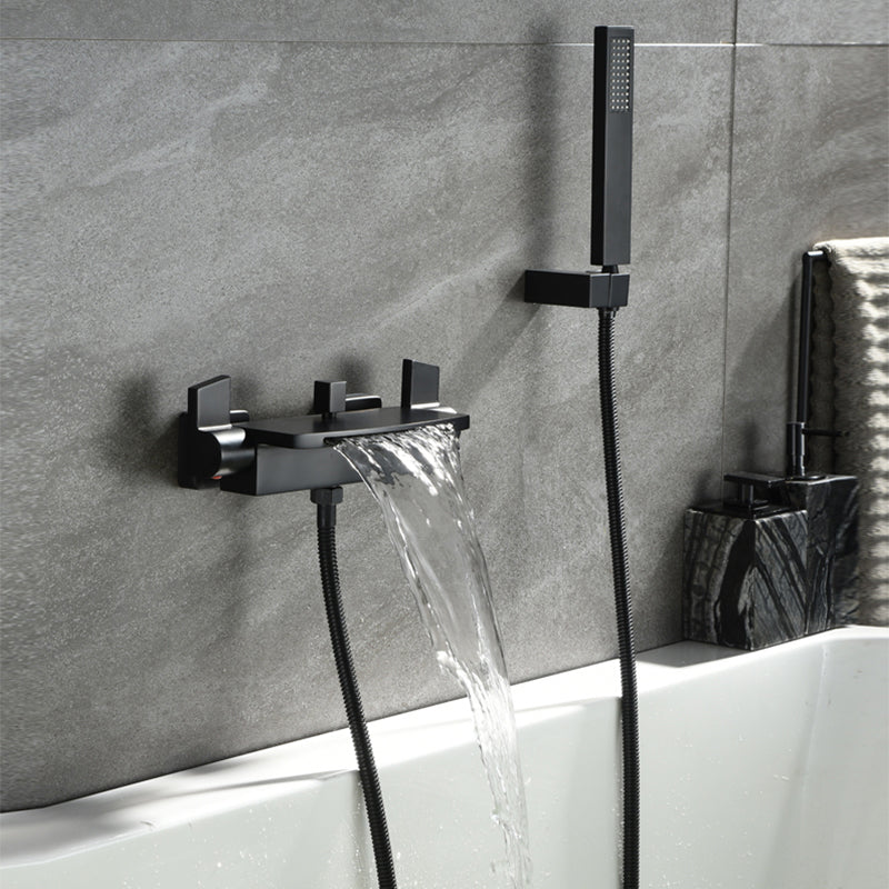 Wall Mounted Metal Tub Filler Low Arc Waterfall Double Handles Tub Faucet Trim Black Hand Shower Included Clearhalo 'Bathroom Remodel & Bathroom Fixtures' 'Bathtub Faucets' 'bathtub_faucets' 'Home Improvement' 'home_improvement' 'home_improvement_bathtub_faucets' 6400294