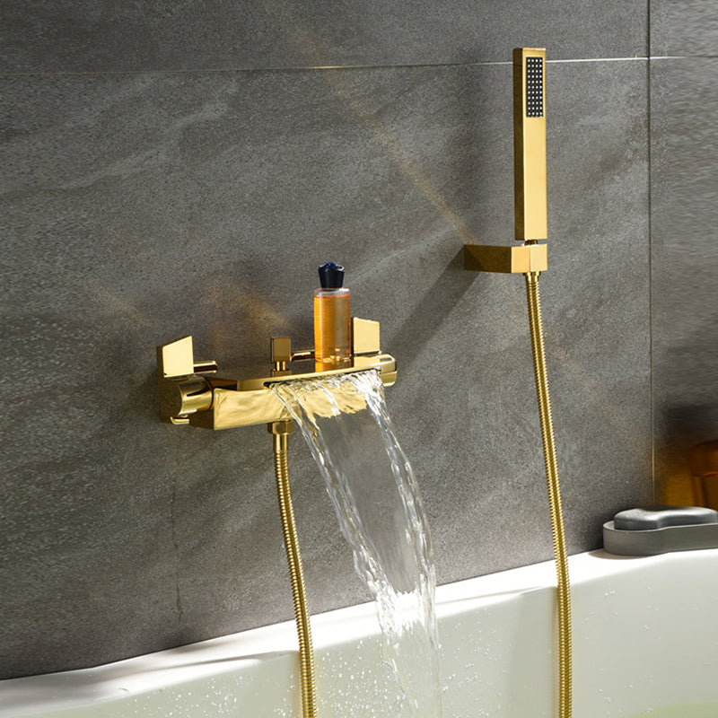 Wall Mounted Metal Tub Filler Low Arc Waterfall Double Handles Tub Faucet Trim Gold Hand Shower Included Clearhalo 'Bathroom Remodel & Bathroom Fixtures' 'Bathtub Faucets' 'bathtub_faucets' 'Home Improvement' 'home_improvement' 'home_improvement_bathtub_faucets' 6400297