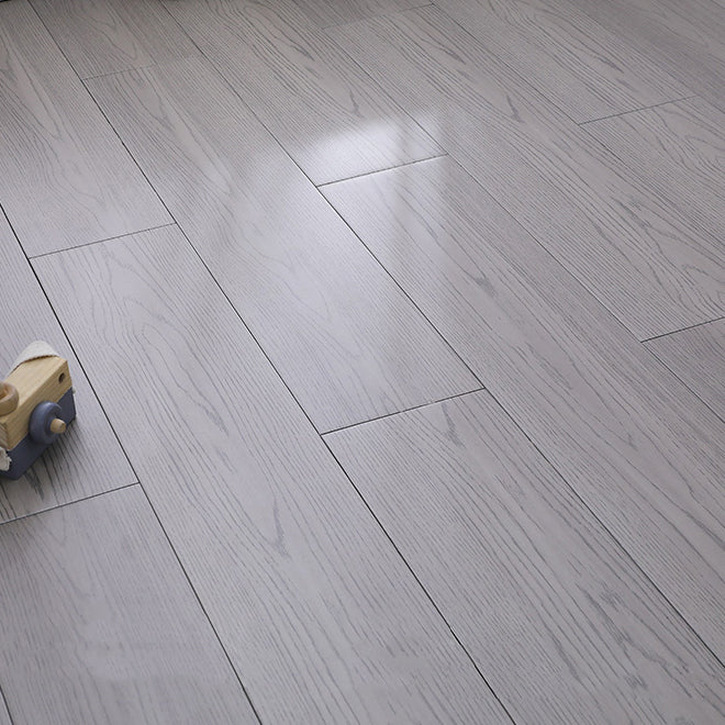 Modern Style Laminate Plank Flooring Wood Laminate Floor with Scratch Resistant Light Gray Clearhalo 'Flooring 'Home Improvement' 'home_improvement' 'home_improvement_laminate_flooring' 'Laminate Flooring' 'laminate_flooring' Walls and Ceiling' 6416684