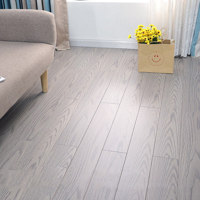 Modern Solid Wood Laminate Floor Light Color Laminate Flooring Gray/ White Clearhalo 'Flooring 'Home Improvement' 'home_improvement' 'home_improvement_laminate_flooring' 'Laminate Flooring' 'laminate_flooring' Walls and Ceiling' 6416852