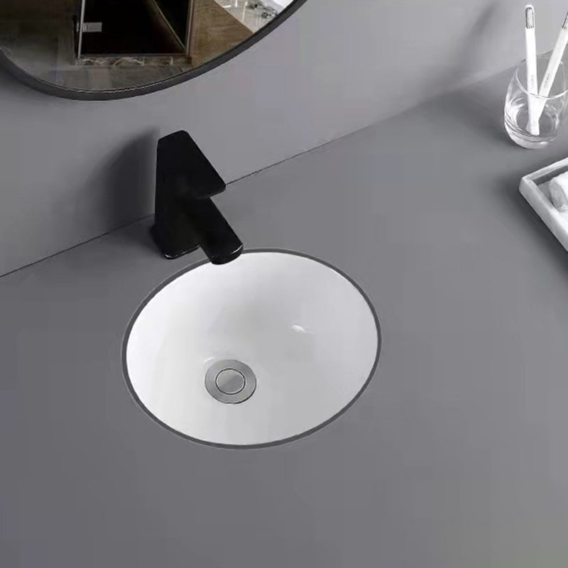 Modern Undermount Bathroom Sink Oval Shape Porcelain with Pop-Up Drain Basin Sink Clearhalo 'Bathroom Remodel & Bathroom Fixtures' 'Bathroom Sinks & Faucet Components' 'Bathroom Sinks' 'bathroom_sink' 'Home Improvement' 'home_improvement' 'home_improvement_bathroom_sink' 6423602