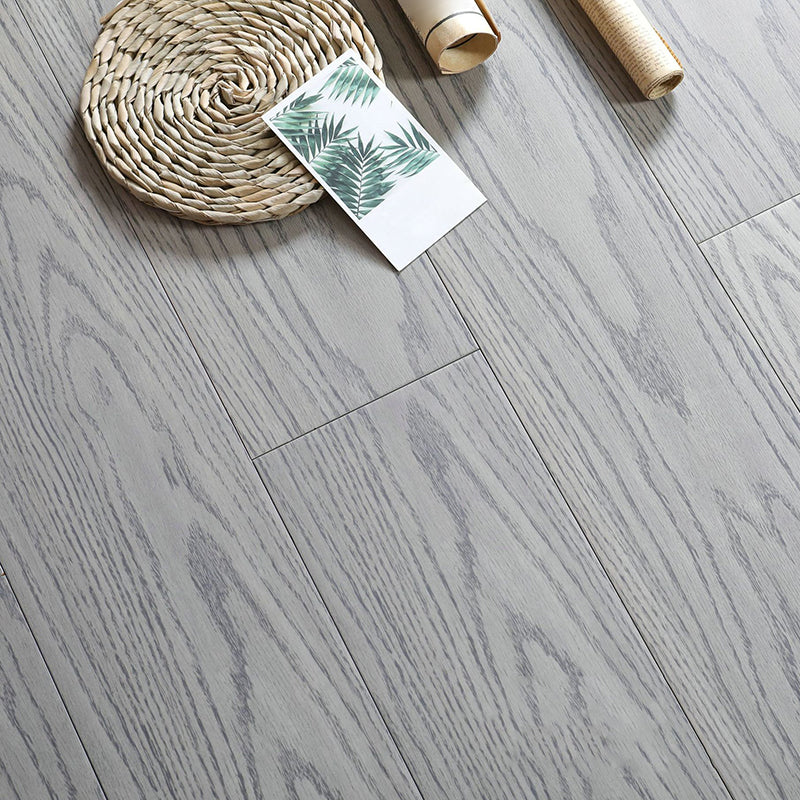 Modern Solid Wood Laminate Flooring Scratch Resistant Laminate Plank Flooring White/ Gray Clearhalo 'Flooring 'Home Improvement' 'home_improvement' 'home_improvement_laminate_flooring' 'Laminate Flooring' 'laminate_flooring' Walls and Ceiling' 6429084