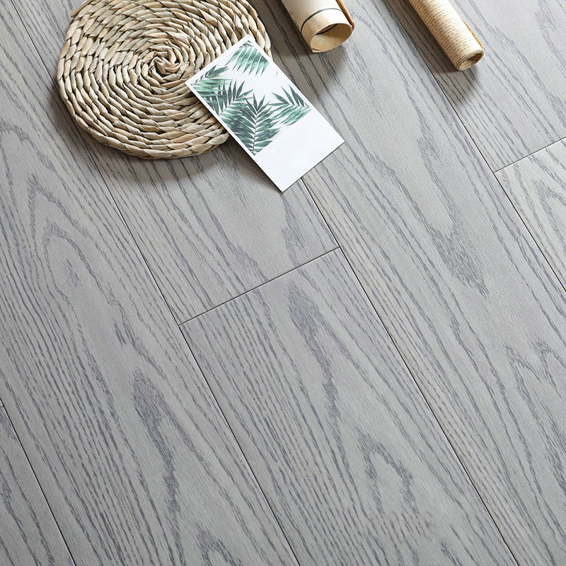 Modern Solid Wood Laminate Flooring Scratch Resistant Laminate Plank Flooring White Gray Clearhalo 'Flooring 'Home Improvement' 'home_improvement' 'home_improvement_laminate_flooring' 'Laminate Flooring' 'laminate_flooring' Walls and Ceiling' 6429084