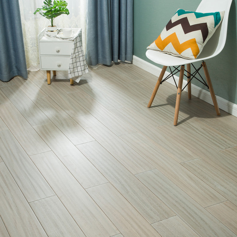 Modern Style Laminate Flooring Wooden Slip Resistant Laminate Warm Gray Clearhalo 'Flooring 'Home Improvement' 'home_improvement' 'home_improvement_laminate_flooring' 'Laminate Flooring' 'laminate_flooring' Walls and Ceiling' 6432136