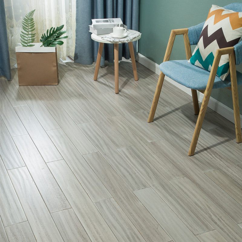 Modern Style Laminate Flooring Wooden Slip Resistant Laminate Silver Gray Clearhalo 'Flooring 'Home Improvement' 'home_improvement' 'home_improvement_laminate_flooring' 'Laminate Flooring' 'laminate_flooring' Walls and Ceiling' 6432139