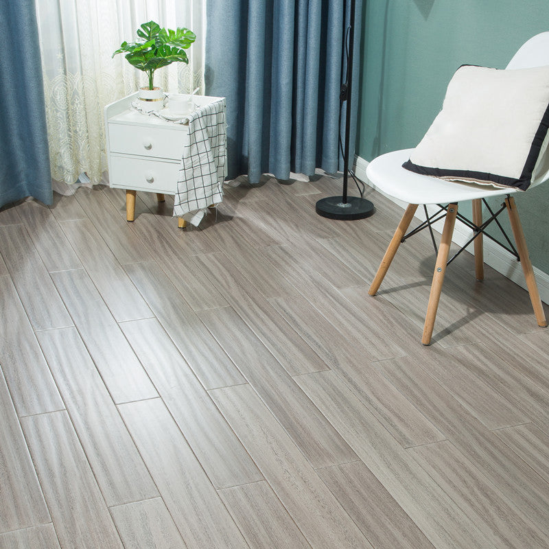 Modern Style Laminate Flooring Wooden Slip Resistant Laminate Smoke Grey Clearhalo 'Flooring 'Home Improvement' 'home_improvement' 'home_improvement_laminate_flooring' 'Laminate Flooring' 'laminate_flooring' Walls and Ceiling' 6432144