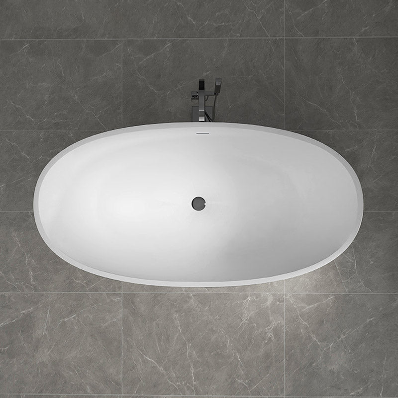 Modern Ellipse Stone Bathtub White Freestand Soaking Bathtub with Overflow Hole Matte White 63"L x 31"W x 22"H Clearhalo 'Bathroom Remodel & Bathroom Fixtures' 'Bathtubs' 'Home Improvement' 'home_improvement' 'home_improvement_bathtubs' 'Showers & Bathtubs' 6483053