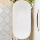 White Oval Bathtub with Drain Acrylic Soaking Freestanding Tub 63"L x 28"W x 24"H Tub Clearhalo 'Bathroom Remodel & Bathroom Fixtures' 'Bathtubs' 'Home Improvement' 'home_improvement' 'home_improvement_bathtubs' 'Showers & Bathtubs' 6548373