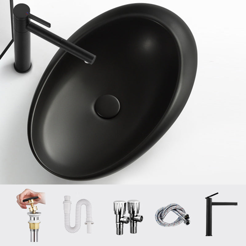 Modern Vessel Bathroom Sink Porcelain Oval Shut-Off Valve Included Vessel 22.8"L x 14.6"W x 5.1"H Black Round Faucet Clearhalo 'Bathroom Remodel & Bathroom Fixtures' 'Bathroom Sinks & Faucet Components' 'Bathroom Sinks' 'bathroom_sink' 'Home Improvement' 'home_improvement' 'home_improvement_bathroom_sink' 6659074