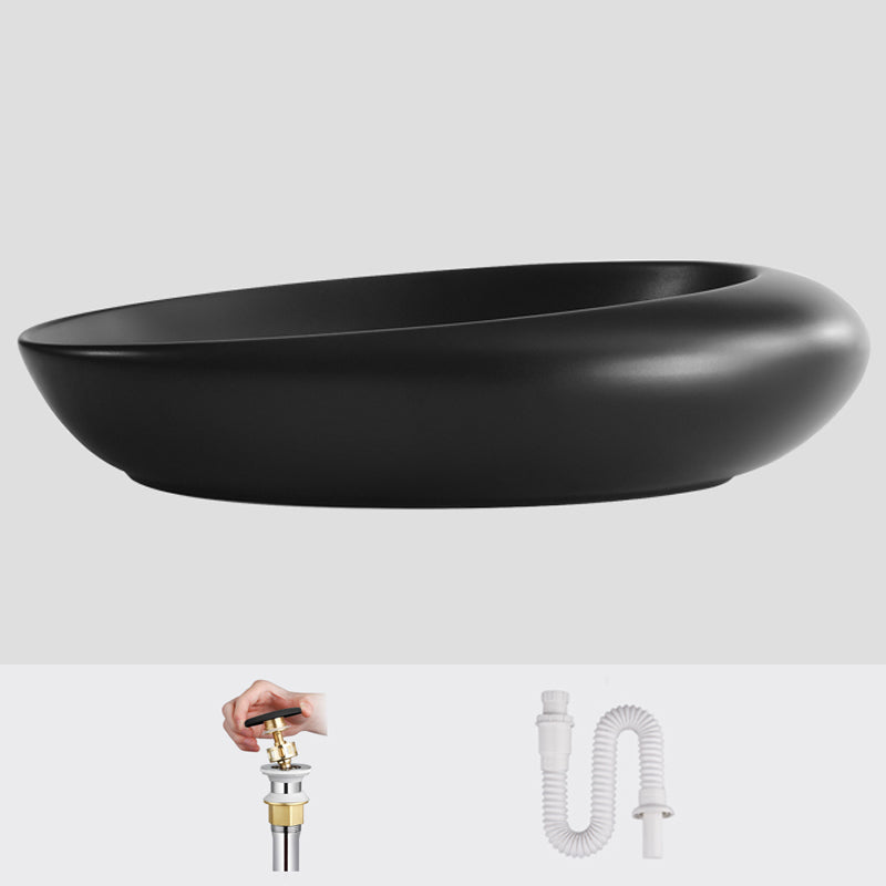 Modern Vessel Bathroom Sink Porcelain Oval Shut-Off Valve Included Vessel 22.8"L x 14.6"W x 5.1"H Black None Clearhalo 'Bathroom Remodel & Bathroom Fixtures' 'Bathroom Sinks & Faucet Components' 'Bathroom Sinks' 'bathroom_sink' 'Home Improvement' 'home_improvement' 'home_improvement_bathroom_sink' 6659076