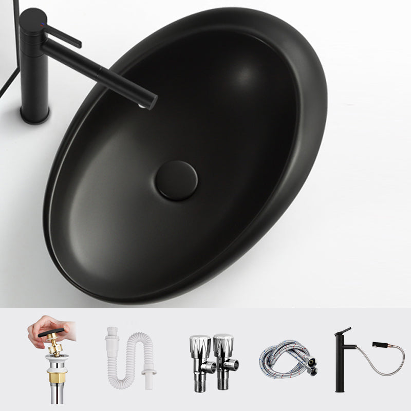 Modern Vessel Bathroom Sink Porcelain Oval Shut-Off Valve Included Vessel 22.8"L x 14.6"W x 5.1"H Black Pull Out Faucet Clearhalo 'Bathroom Remodel & Bathroom Fixtures' 'Bathroom Sinks & Faucet Components' 'Bathroom Sinks' 'bathroom_sink' 'Home Improvement' 'home_improvement' 'home_improvement_bathroom_sink' 6659078