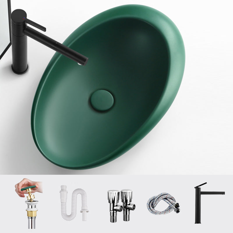 Modern Vessel Bathroom Sink Porcelain Oval Shut-Off Valve Included Vessel 22.8"L x 14.6"W x 5.1"H Green Round Faucet Clearhalo 'Bathroom Remodel & Bathroom Fixtures' 'Bathroom Sinks & Faucet Components' 'Bathroom Sinks' 'bathroom_sink' 'Home Improvement' 'home_improvement' 'home_improvement_bathroom_sink' 6659081
