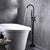 Floor Mounted Metal Freestanding Tub Filler Double Handles Freestanding Faucet with Hose Matte Black Gooseneck Clearhalo 'Bathroom Remodel & Bathroom Fixtures' 'Bathtub Faucets' 'bathtub_faucets' 'Home Improvement' 'home_improvement' 'home_improvement_bathtub_faucets' 6681440