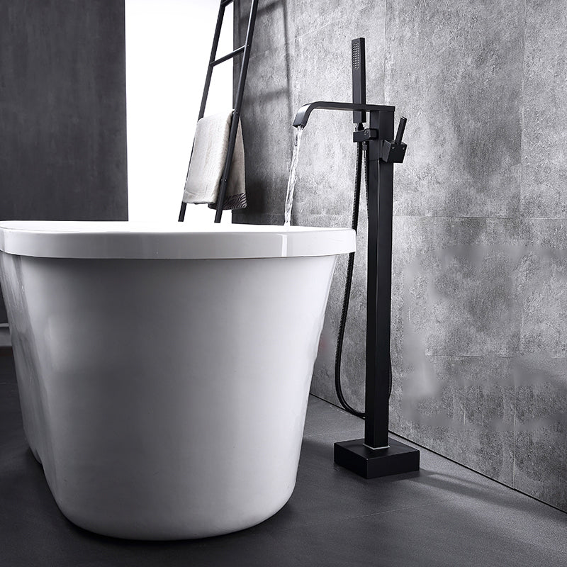 Floor Mounted Metal Freestanding Tub Filler Swivel Freestanding Faucet with Spray Gun Black Flat Clearhalo 'Bathroom Remodel & Bathroom Fixtures' 'Bathtub Faucets' 'bathtub_faucets' 'Home Improvement' 'home_improvement' 'home_improvement_bathtub_faucets' 6697451