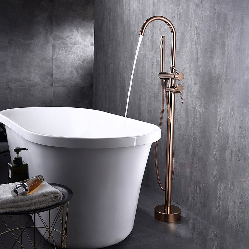 Floor Mounted Metal Freestanding Tub Filler Swivel Freestanding Faucet with Spray Gun Rose Gold Round Clearhalo 'Bathroom Remodel & Bathroom Fixtures' 'Bathtub Faucets' 'bathtub_faucets' 'Home Improvement' 'home_improvement' 'home_improvement_bathtub_faucets' 6697459