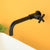 Wall Mounted Faucet Single Cross Handle Sink Faucet for Bathroom Nero Clearhalo 'Bathroom Remodel & Bathroom Fixtures' 'Bathroom Sink Faucets' 'Bathroom Sinks & Faucet Components' 'bathroom_sink_faucets' 'Casa' 'Home Improvement' 'home_improvement' 'home_improvement_bathroom_sink_faucets' 6713323