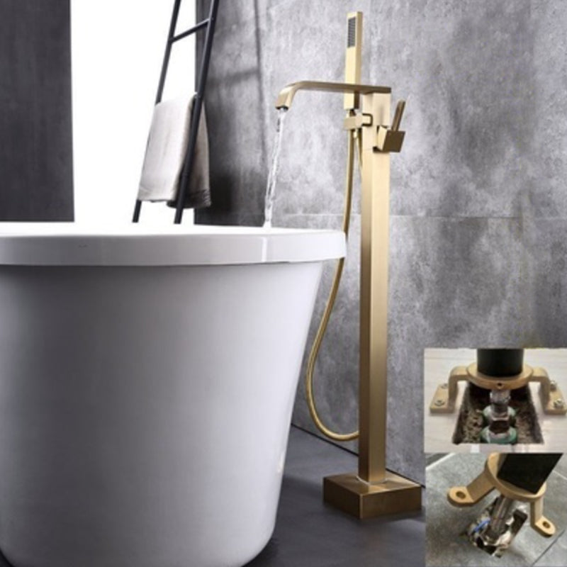 Floor Mounted Metal Freestanding Tub Filler 1 Handle Freestanding Bathtub Faucet Gold Flat Tupe Hand Shower Included Clearhalo 'Bathroom Remodel & Bathroom Fixtures' 'Bathtub Faucets' 'bathtub_faucets' 'Home Improvement' 'home_improvement' 'home_improvement_bathtub_faucets' 6714516