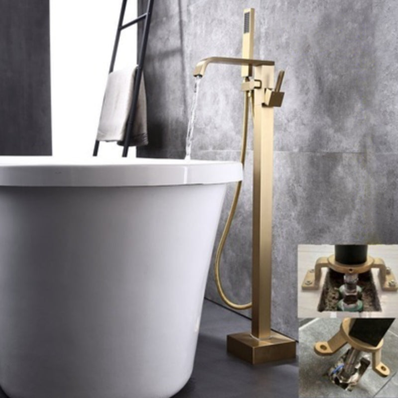 Floor Mounted Metal Freestanding Tub Filler 1 Handle Freestanding Bathtub Faucet Gold Flat Tupe Hand Shower Included Clearhalo 'Bathroom Remodel & Bathroom Fixtures' 'Bathtub Faucets' 'bathtub_faucets' 'Home Improvement' 'home_improvement' 'home_improvement_bathtub_faucets' 6714516